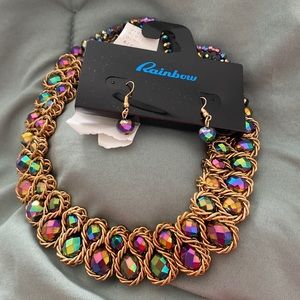 New. Never worn necklace and matching earrings from Rainbow.